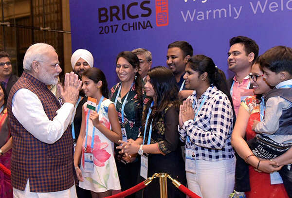 Narendra Modi is welcomed by Indian community