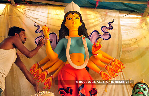 An artist gives finishing touches