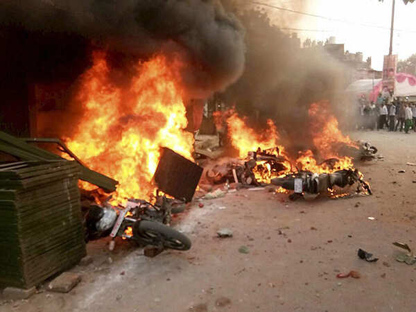 Vehicles set on fire after a clash between two communities