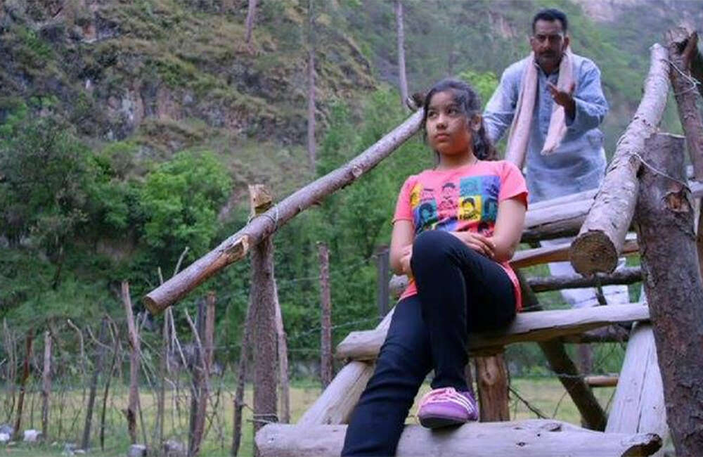 A still from Badri: The Cloud