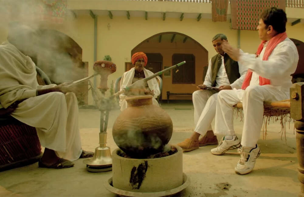A still from Muavza: Zameen Ka Paisa