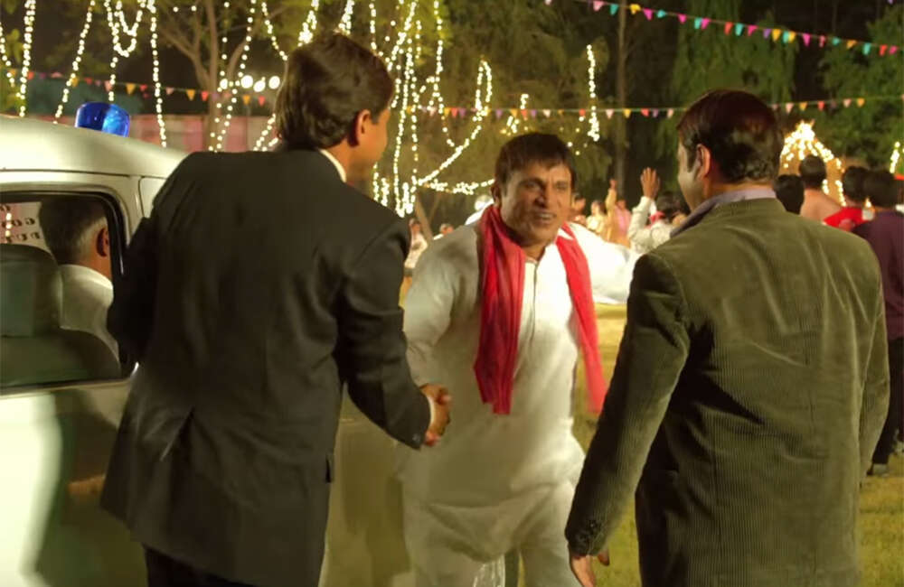 A still from Muavza: Zameen Ka Paisa