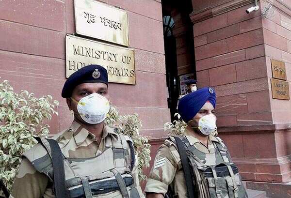 CISF jawans wear anti-pollution masks