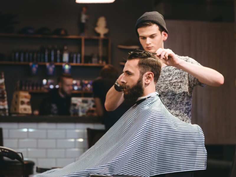 How many haircuts do you think happen in America every year?
