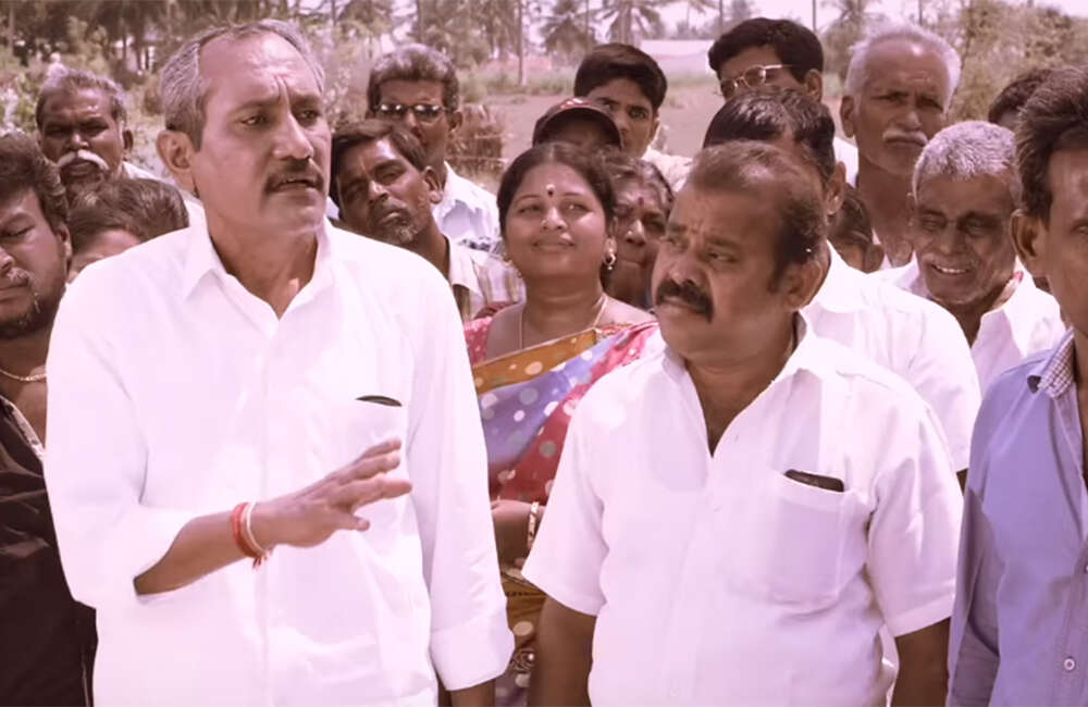 A still from Guru Uchaththula Irukkaru