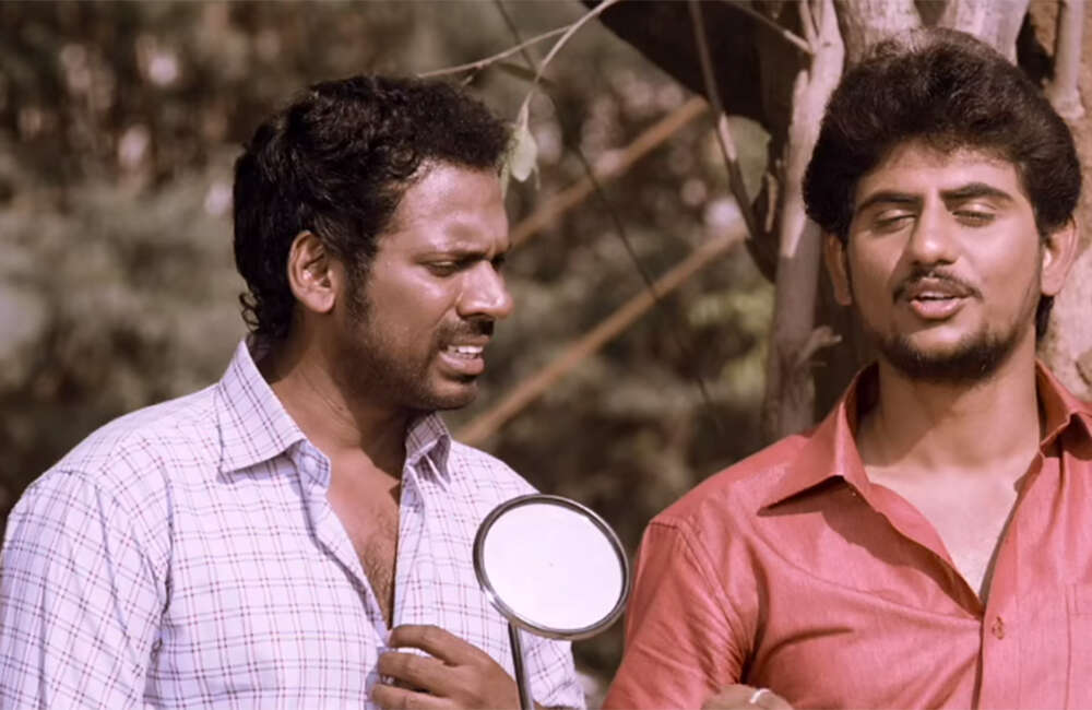 A still from Guru Uchaththula Irukkaru