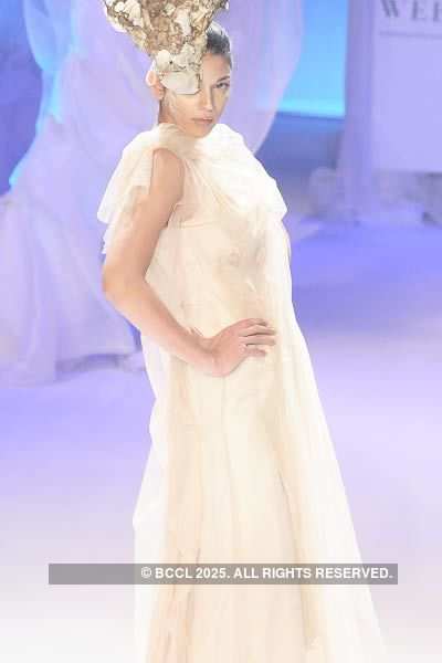 A model presents a creation by designer Gaurav Gupta during Pearls ...