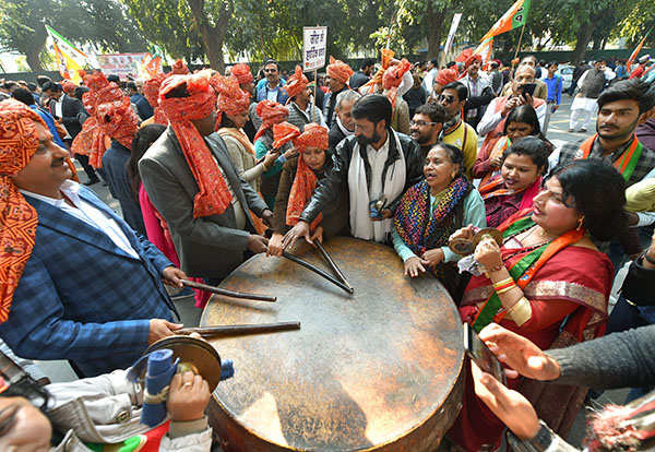 BJP workers celebrate victory as party wins Gujarat, Himachal
