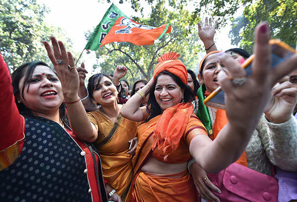 BJP workers celebrate victory as party wins Gujarat, Himachal