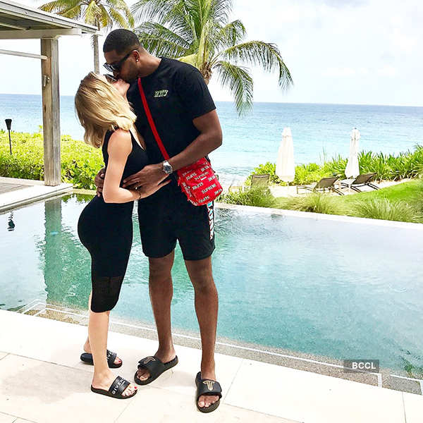Parents-to-be Khloe Kardashian and Tristan Thompson share a passionate kiss