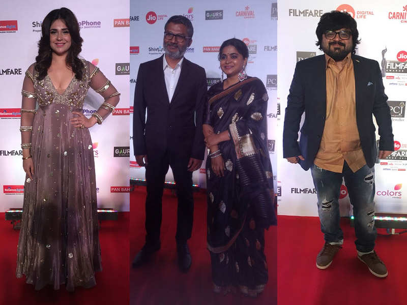 Meher Vij, Nitesh Tiwari with wife Ashwiny Iyer Tiwari, and Pritam arrive at the 63rd Jio Filmfare Awards red carpet