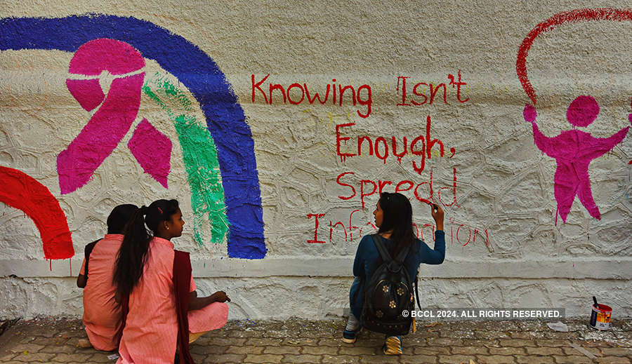 Children Paint A Wall To Spread Cancer Awareness Under The Theme A Rainbow Of Happiness To Commemorate The World Cancer Day Near Ganpati Chowk In Viman Nagar Photogallery