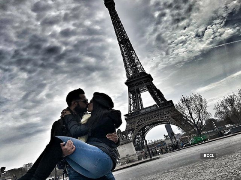 Newlyweds Vatsal Seth and Ishita Dutta kiss in front of the Eiffel tower