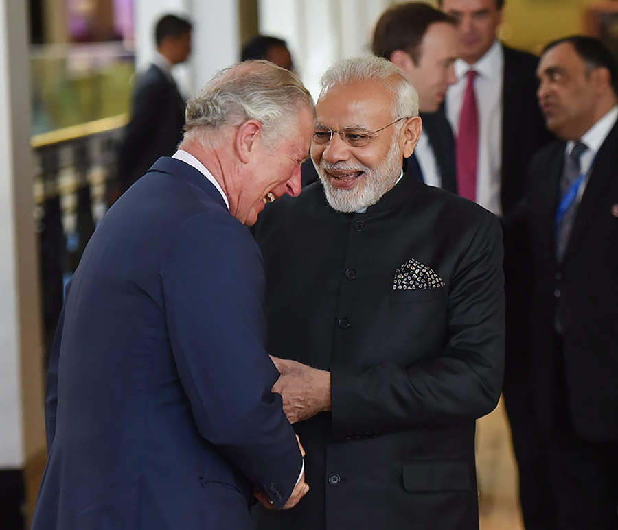 Photos: PM Modi meets UK's Prince Charles and Queen