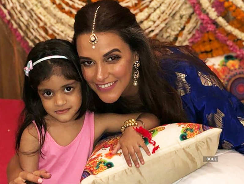Mommy-to-be Neha Dhupia flaunts her baby bump in these new pictures