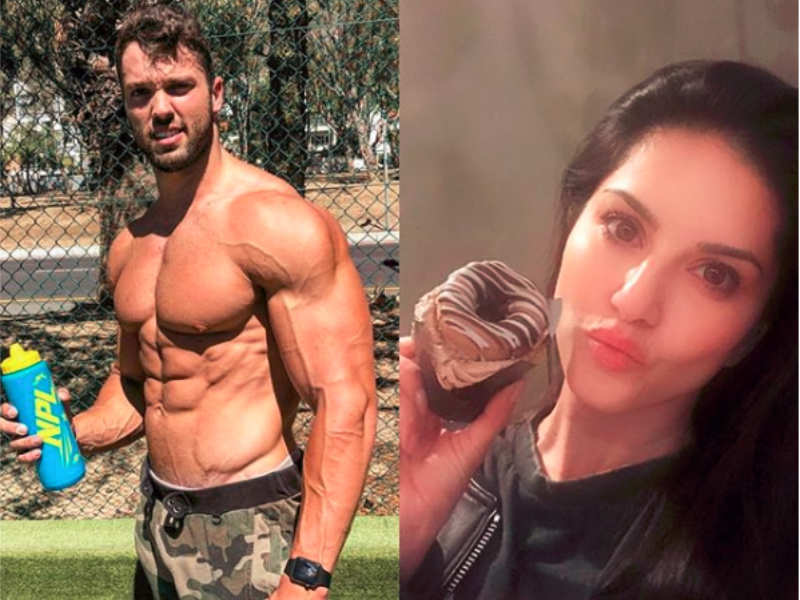Sunny Leone gets a doughnut cupcake from her gym trainer on her Birthday
