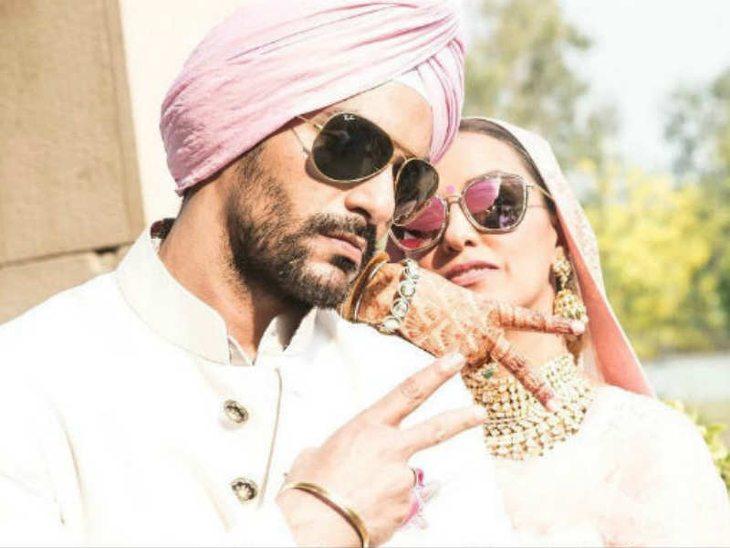 Neha Dhupia slams a troll who took a dig at her marriage to Angad Bedi