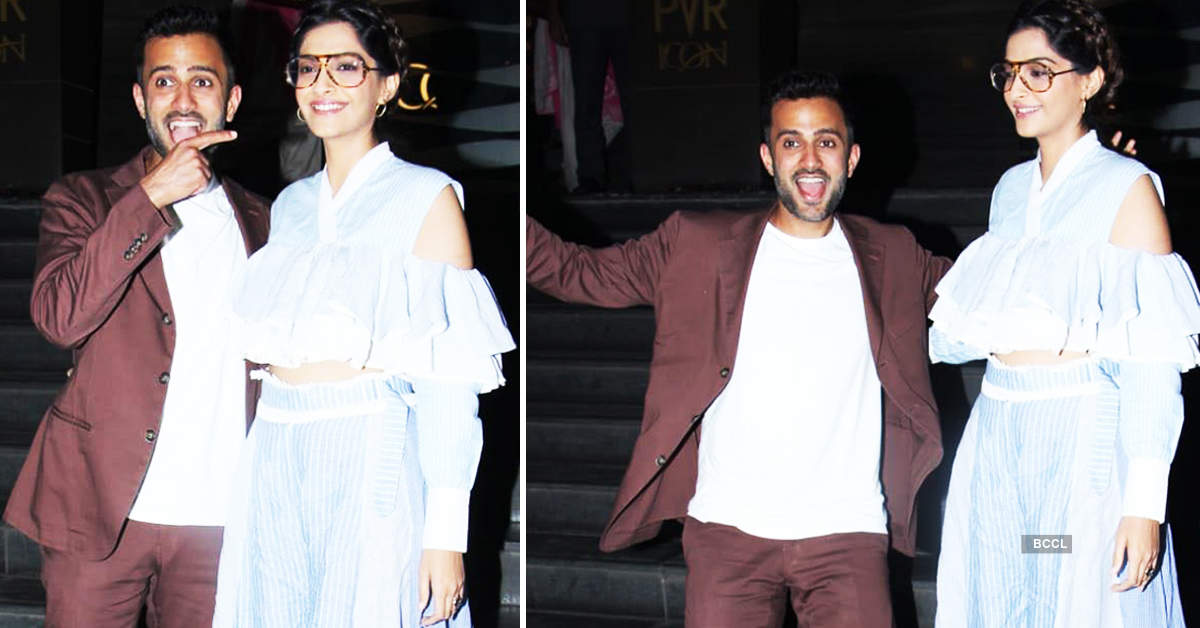 Sonam Kapoor blushes as hubby Anand Ahuja holds her dupatta