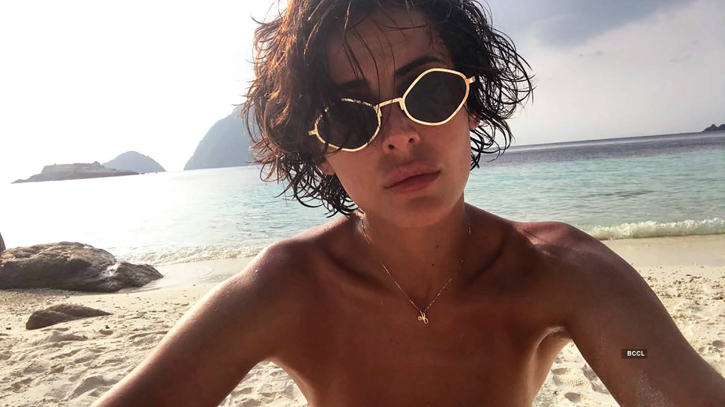 Bikini-clad Mandana Karimi is turning up the heat with her pool pictures