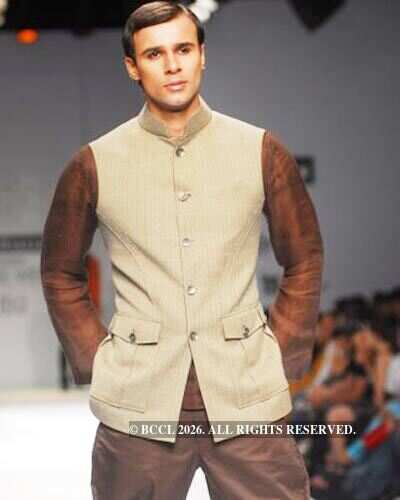 A model presents a creation by designers Rohit and Abhishek on the 3rd ...