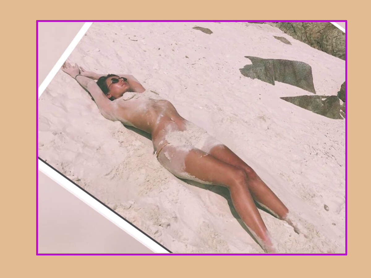 The actress wrote, “Lifes a beach,and Im just playing in the sand...sandba...