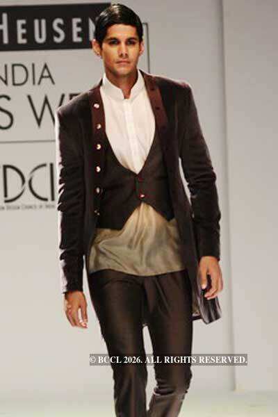 A model presents a creation by designers Rohit and Abhishek on the 3rd ...
