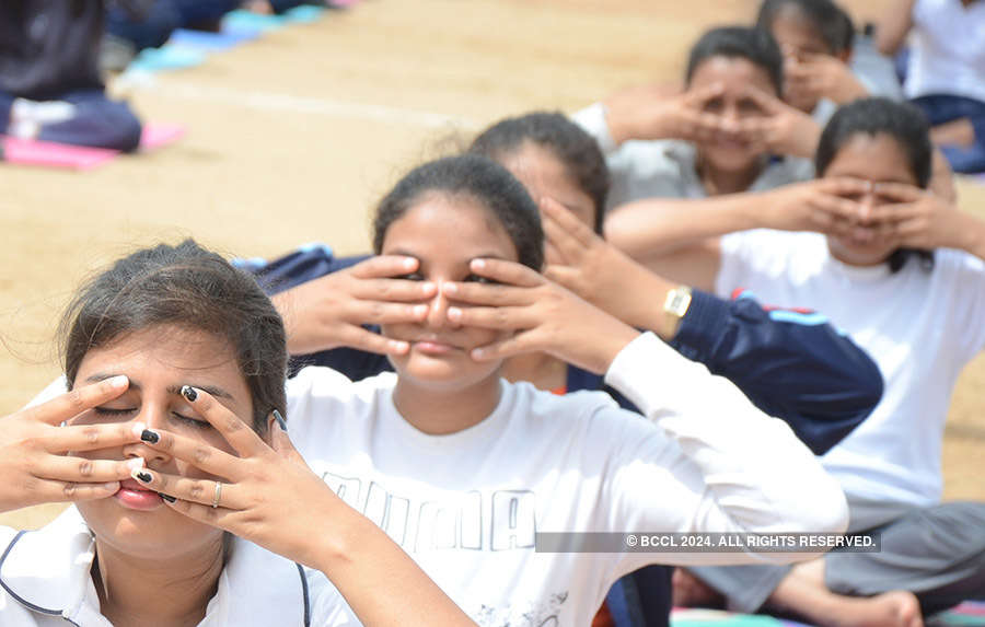 PM Narendra Modi performs asanas with volunteers to mark International Yoga Day