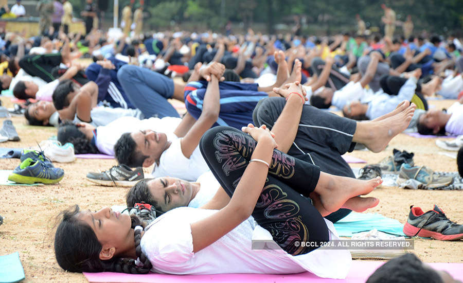 PM Narendra Modi performs asanas with volunteers to mark International Yoga Day