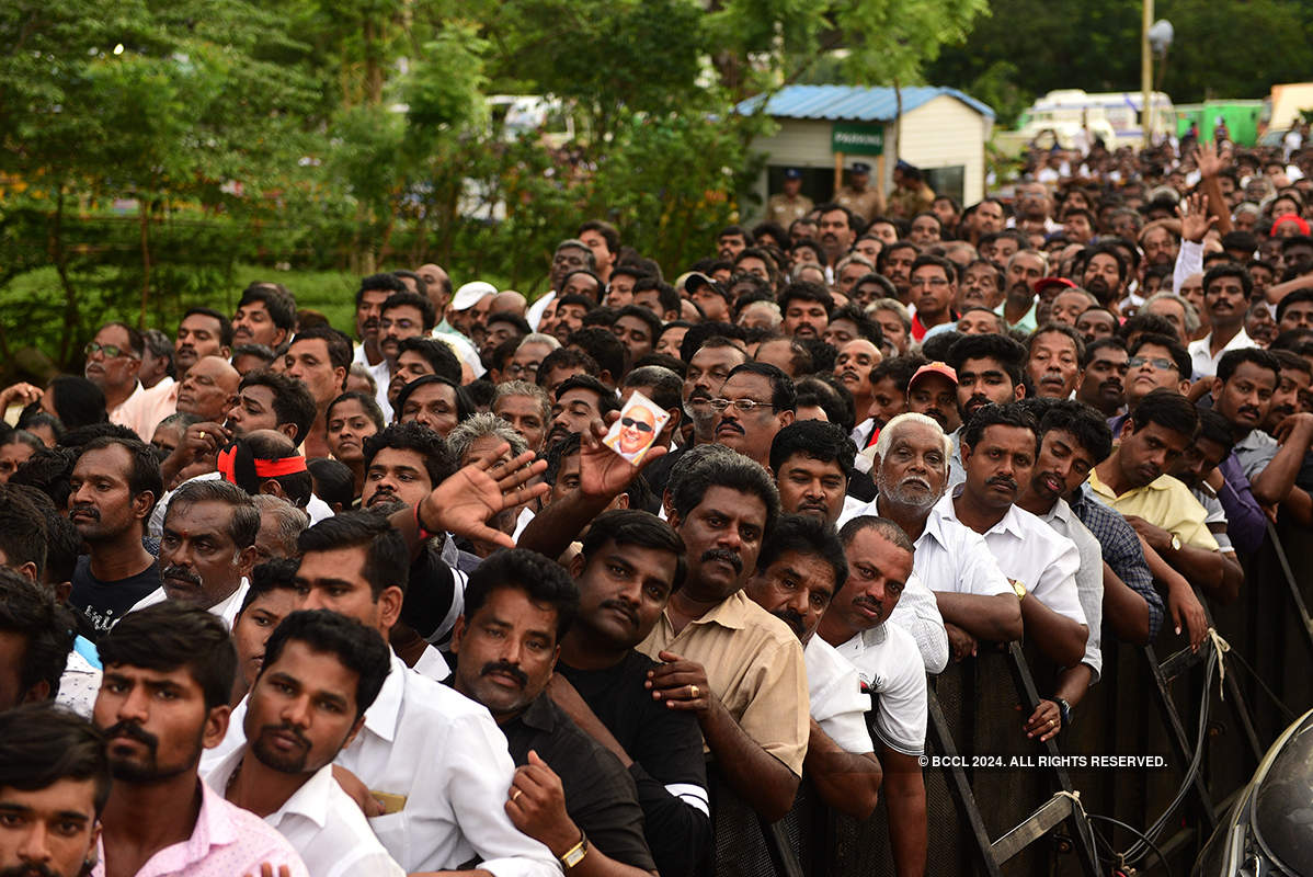 PM Narendra Modi and thousands of DMK supporters pay last respects to M Karunanidhi