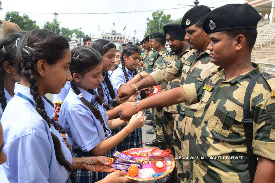 Women tie rakhis to jawans, police personnel