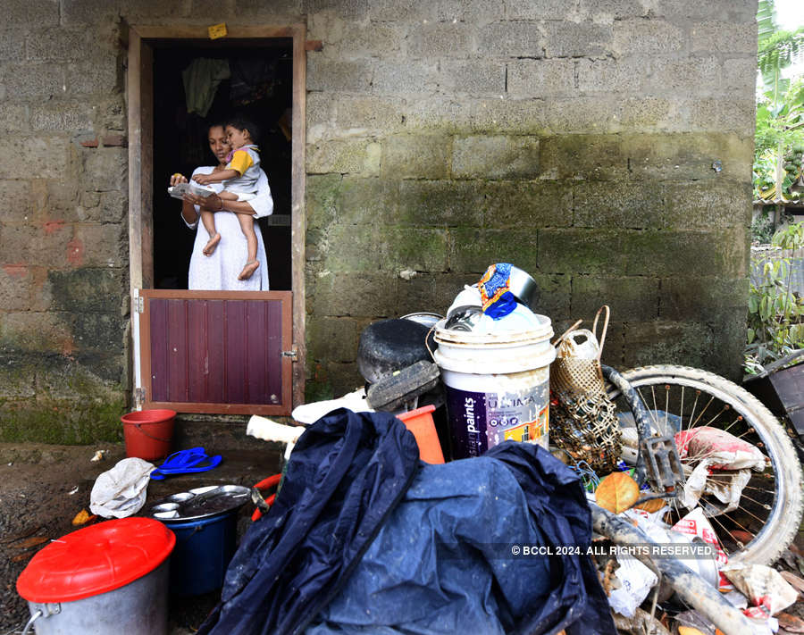 Kerala flood victims return to devastated homes