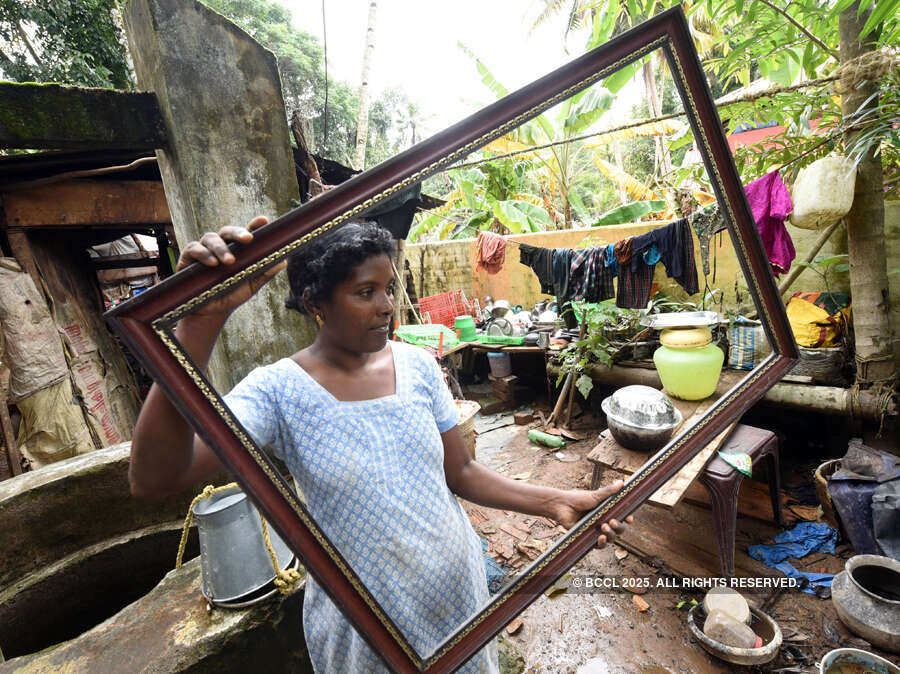 Kerala flood victims return to devastated homes
