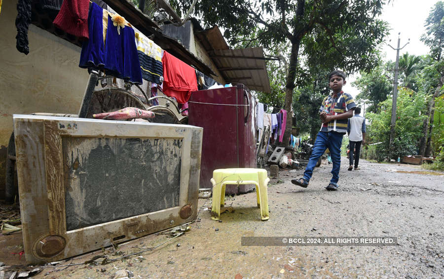 Kerala flood victims return to devastated homes