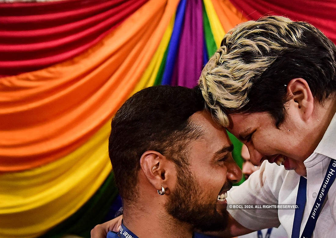 People belonging to the lesbian, gay, bisexual and transgender (LGBT) community celebrate after the Supreme Courts verdict of decriminalizing gay sex and revocation of the Section 377 law, at an NGO in