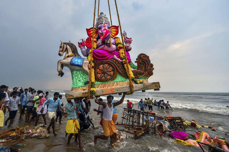 Devotees immerse idols of Lord Ganesha 