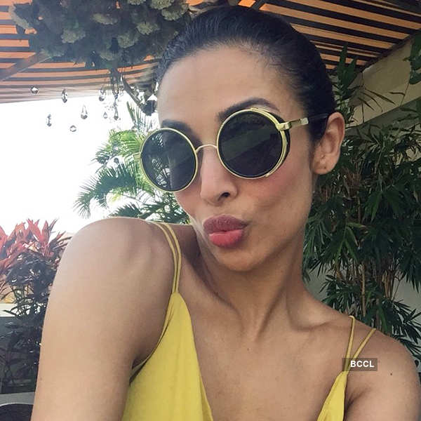 Malaika Arora drops head-turning pictures in multi-tiered dress