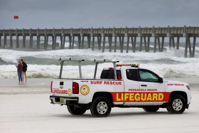 Lifeguards patrol the beach in advance of Hurricane Michael in ...