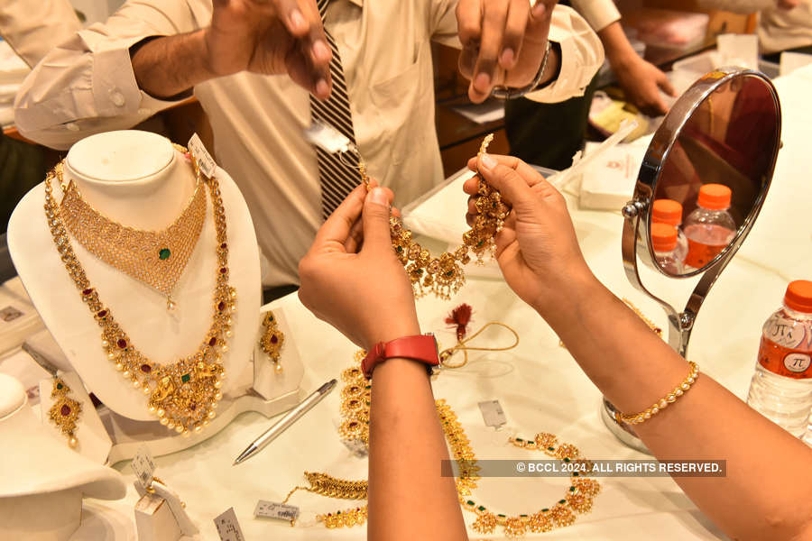 Gold loses sheen, down Rs 80 on weak trend overseas