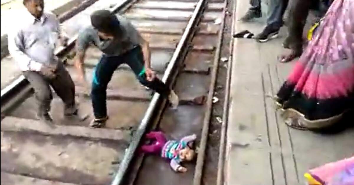 Watch 1yrold girl miraculously survives falling on train tracks as