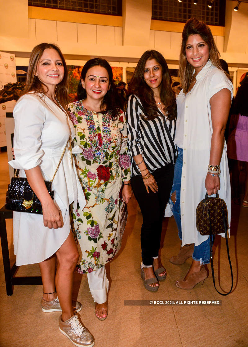 Bollywood celebrities and socialites attend art exhibition 'Breaking Barriers'