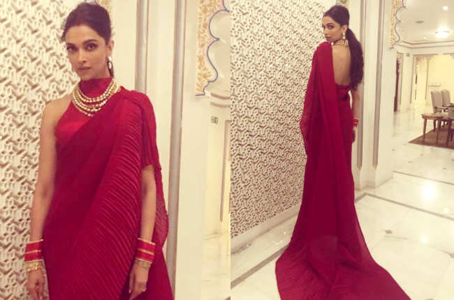 Deepika Padukone wows in a red sari at Isha Ambani-Anand Piramal's ...