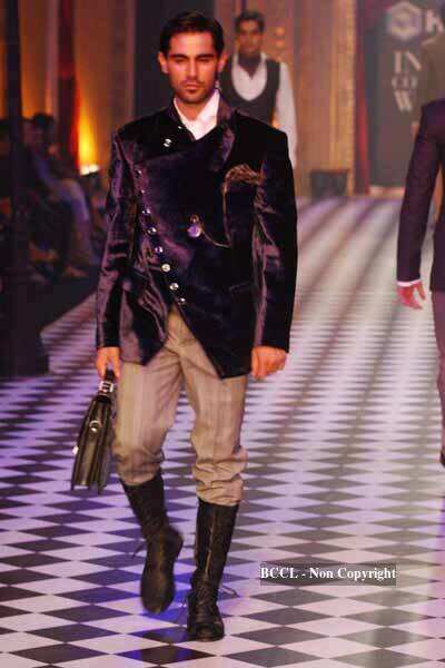 Karan Johar and designer Varun Bahl walk the ramp with B'wood ...