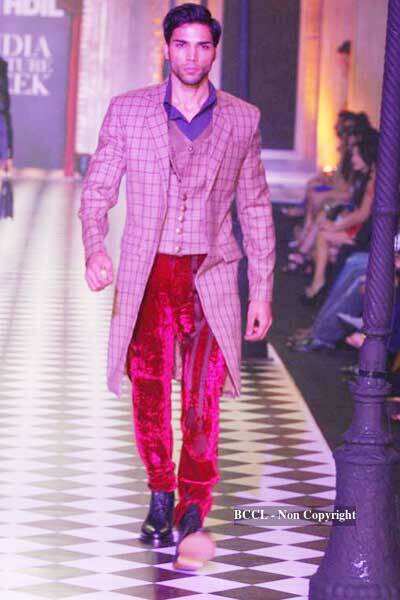 Karan Johar and designer Varun Bahl walk the ramp with B'wood ...
