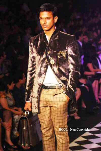 Karan Johar and designer Varun Bahl walk the ramp with B'wood ...