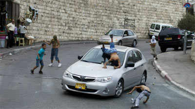 Israeli motorist hits Palestinian boys