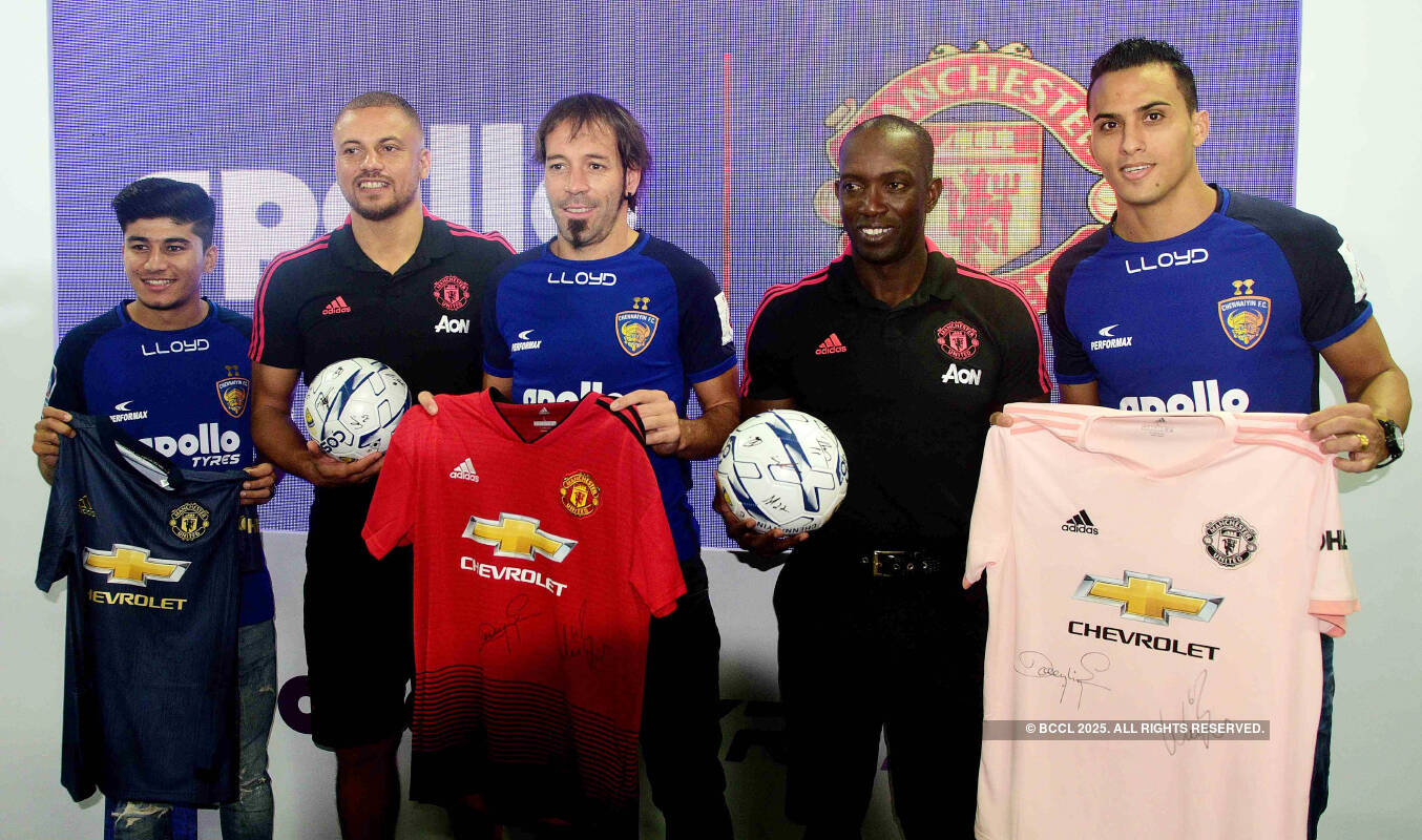 Manchester United players Wes Brown and Dwight Yorke attend a promotional event