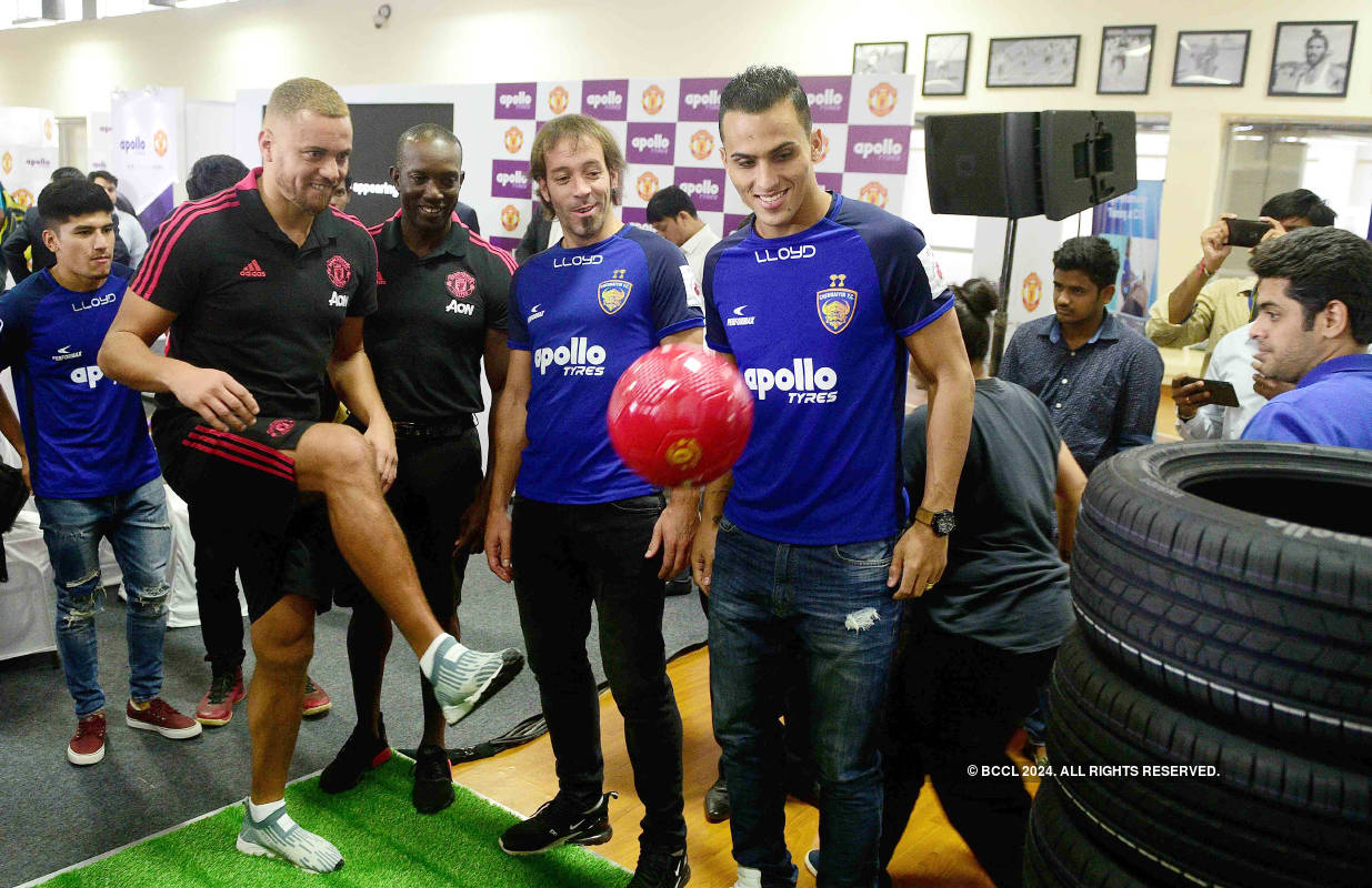 Manchester United players Wes Brown and Dwight Yorke attend a promotional event