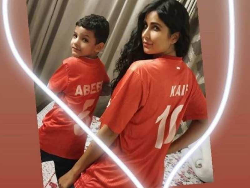 Katrina Kaif poses with a fan for an adorable picture