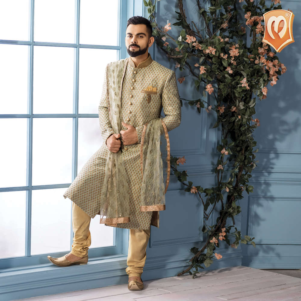 2. Off beat pista green embroidered sherwani layered with a tulle ...