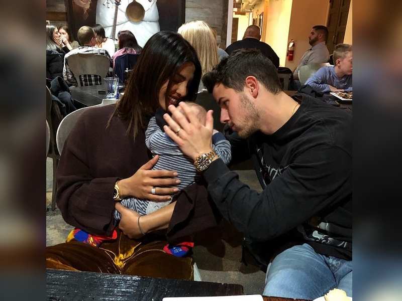 Photo of Priyanka Chopra and Nick Jonas with a cute little baby will melt your hearts